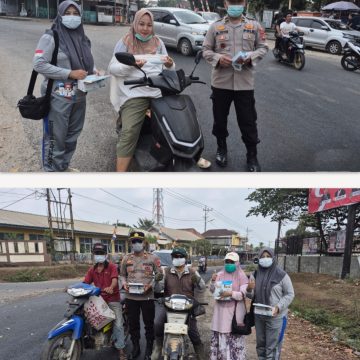 Polsek Tanjung Batu dan Puskesmas Bagikan Masker Gratis untuk Pengguna Jalan di Ogan Ilir